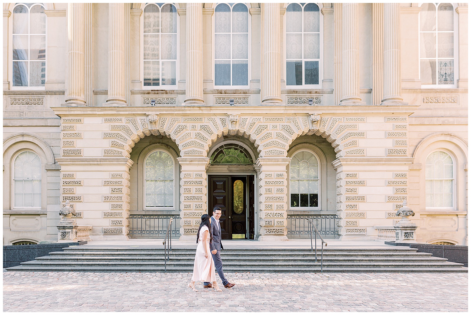 Osgoode Hall Summer Engagement Session - Couple walking at Osgoode Hall