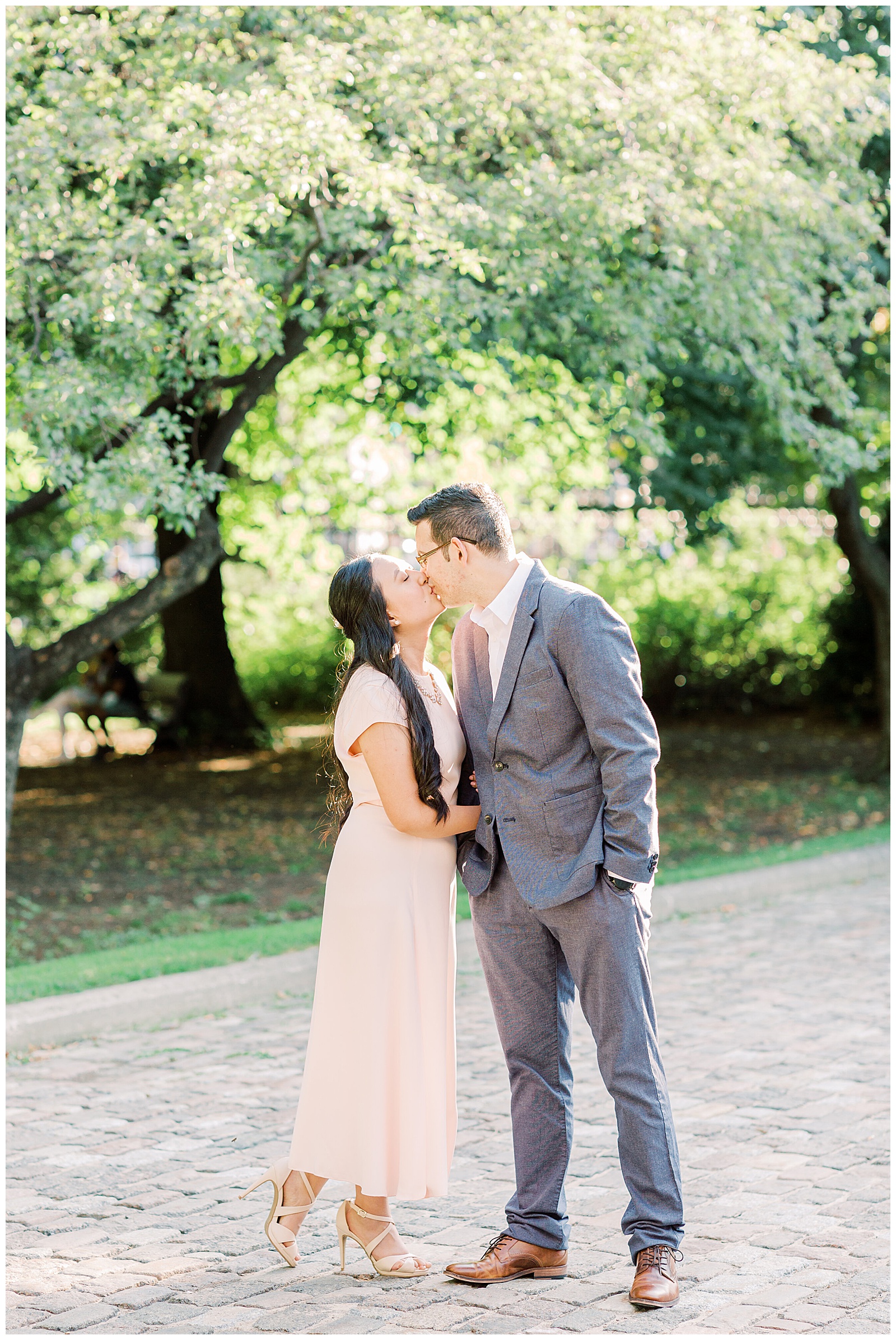 Osgoode Hall Summer Engagement Session - Couple kissing at Osgoode Hall